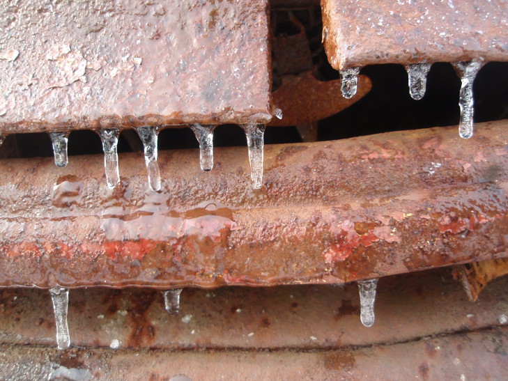 car part covered in ice