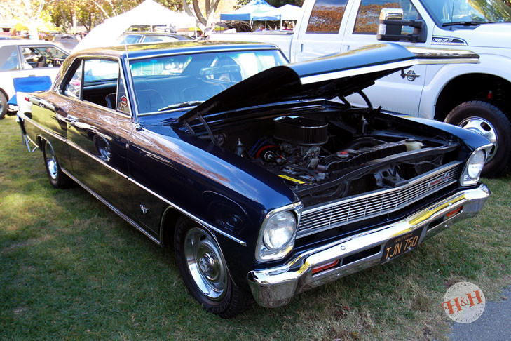 A clean black classic Chevy II